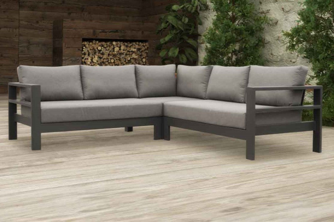 A contemporary 5 seater outdoor lounge featuring sleek lines and grey cushions, perfect for stylish outdoor lounging.