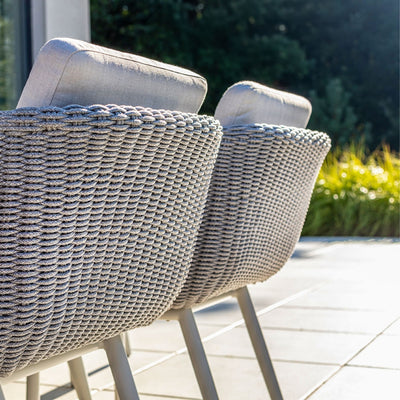 Close-up of the Sorrento Dining Chair by Couture Jardin, showcasing the intricate craftsmanship of the woven Olaphen rope in a soft, textured pattern. The durable and stylish rope design enhances the chair's aesthetic and functionality, ideal for outdoor use.