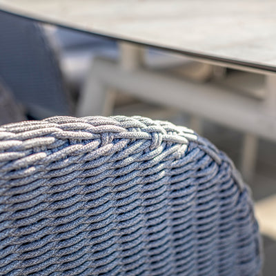 Close-up of the Sorrento Dining Chair by Couture Jardin, showcasing the intricate craftsmanship of the woven Olaphen rope in a soft, textured pattern. The durable and stylish rope design enhances the chair's aesthetic and functionality, ideal for outdoor use.