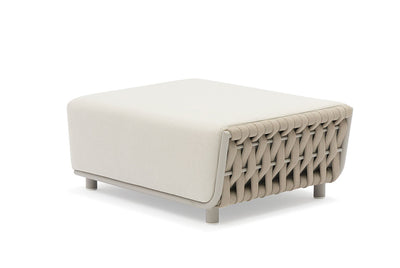A beige ottoman for outdoor furniture with aluminium frame legs, and comfortable cushions, set against a plain white background.